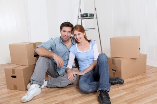 Team member loading items safely into a moving van