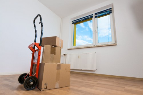 Professional moving team using insurance and safety procedures in Forestgate