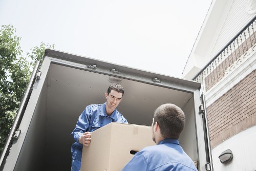 Boxes and household items being organized for transport